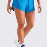 CRZ YOGA Women's Mid Waisted Dolphin Shorts 4" White